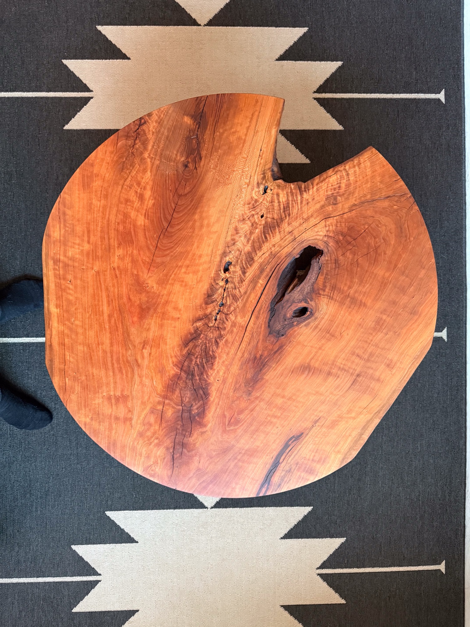 Hand-rubbing hardwax oil into a live-edge hardwood top